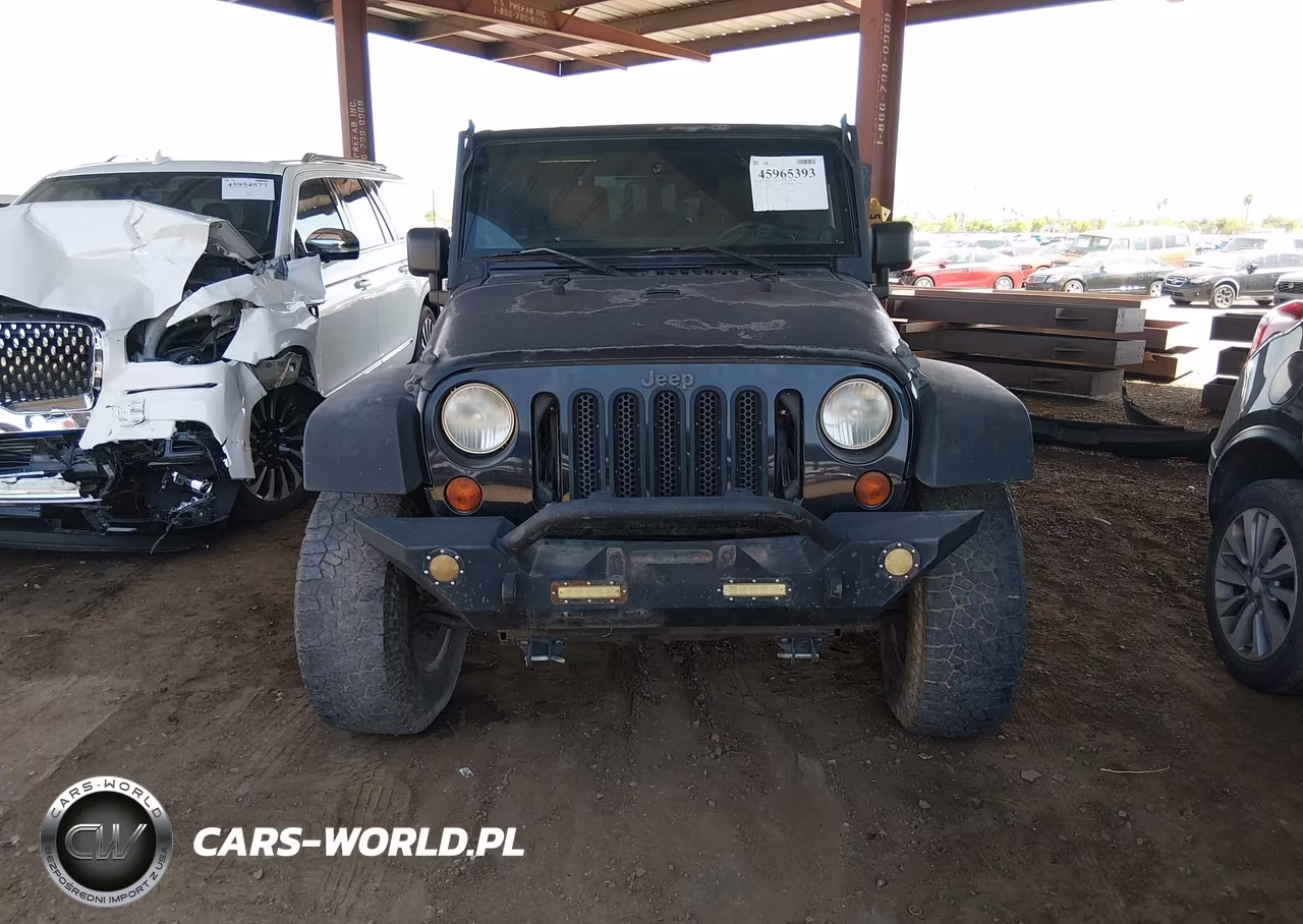 2011 Jeep Wrangler Unlimited Rubicon VIN:1J4BA6H16BL534413 - 6