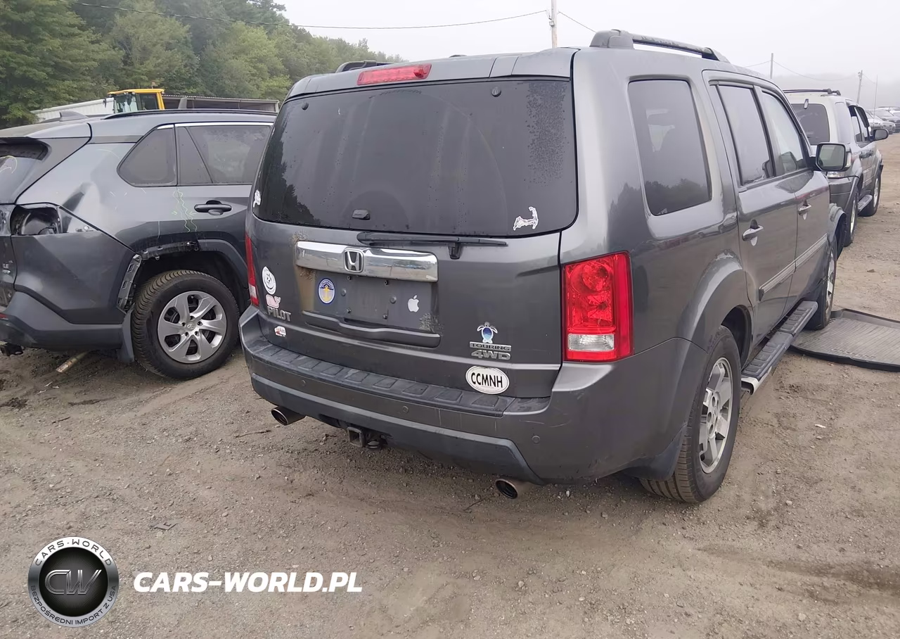 2011 Honda Pilot Touring VIN:5FNYF4H96BB055102 - 4