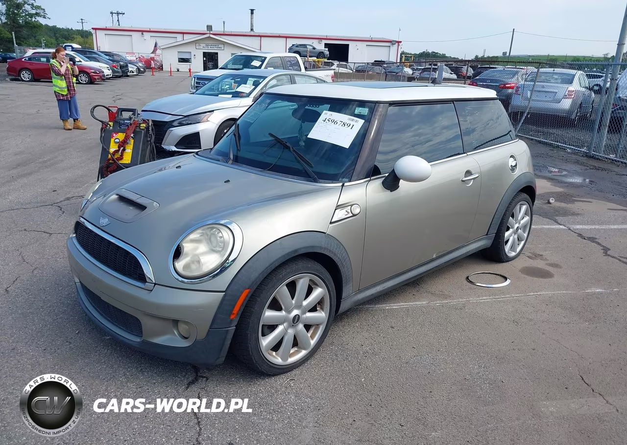 2007 Mini Cooper S VIN:WMWMF73537TL90517 - 2