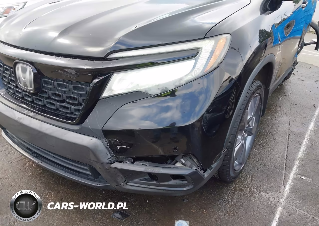 2019 Honda Passport Touring VIN:5FNYF7H94KB010662 - 17