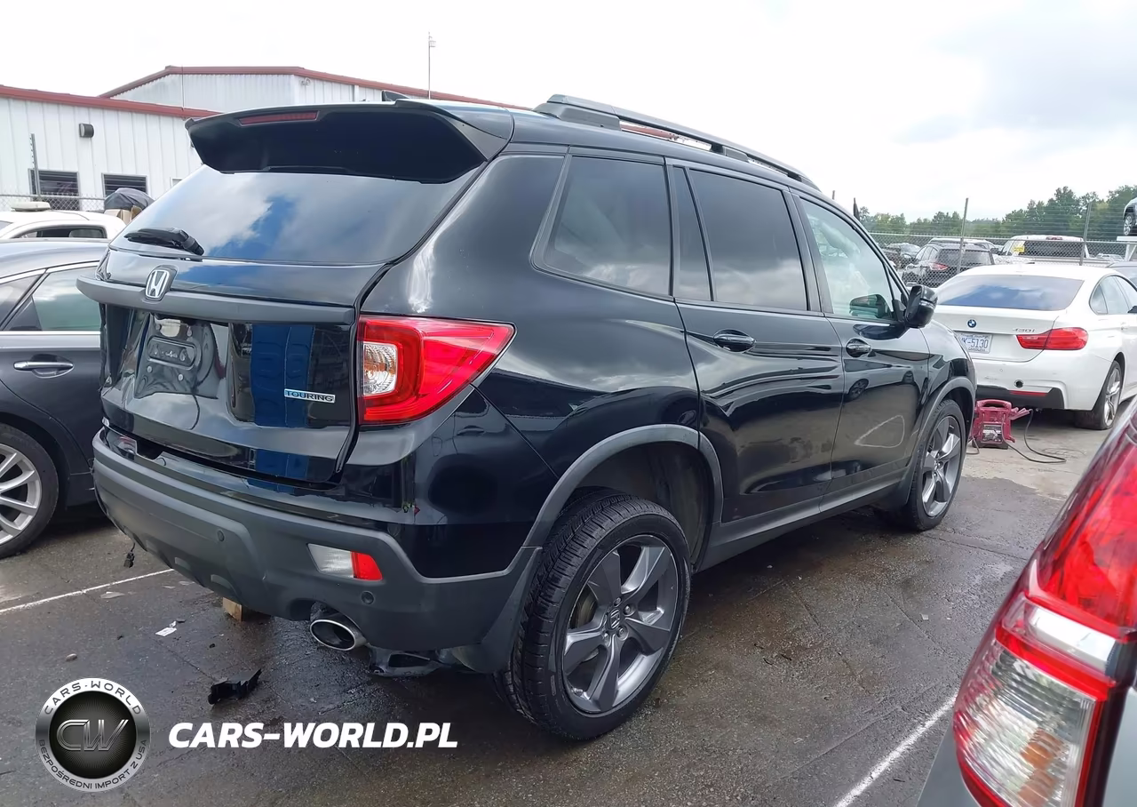 2019 Honda Passport Touring VIN:5FNYF7H94KB010662 - 4