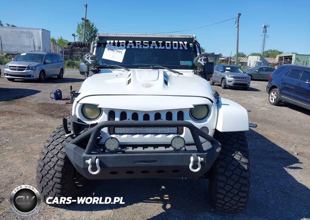 2014 Jeep Wrangler Unlimited Sahara VIN:1C4BJWEG0EL118750 - 12