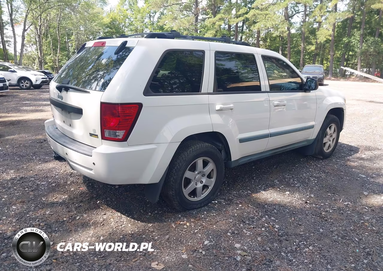 2009 Jeep Grand Cherokee Laredo VIN:1J8HR48P89C545675 - 4
