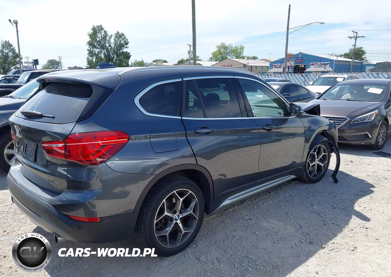 2018 BMW X1 xDrive28I VIN:WBXHT3C3XJ5L32875 - 4