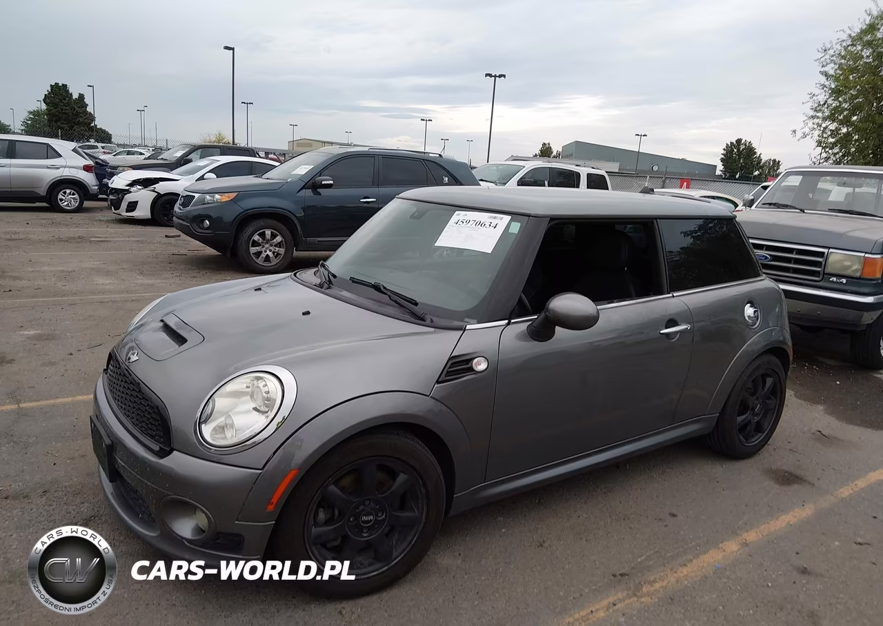2009 Mini Cooper S VIN:WMWMF735X9TX40521 - 2