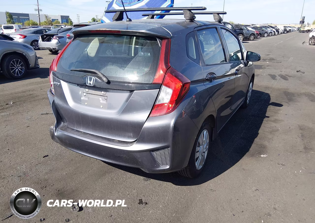 2015 Honda Fit Lx VIN:3HGGK5H53FM714332 - 4