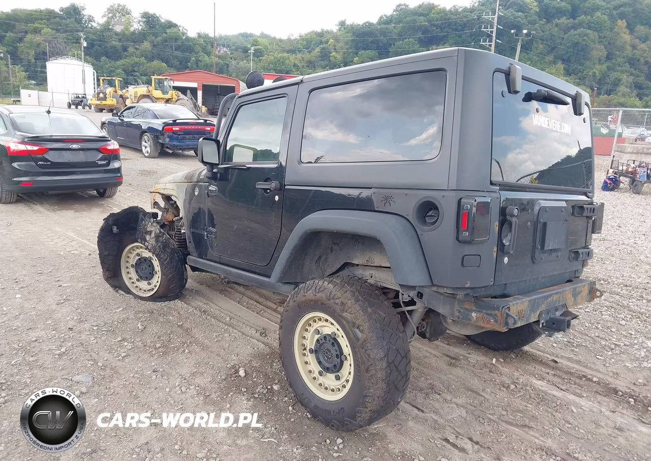 2017 Jeep Wrangler Willys Wheeler VIN:1C4AJWAG7HL553917 - 3