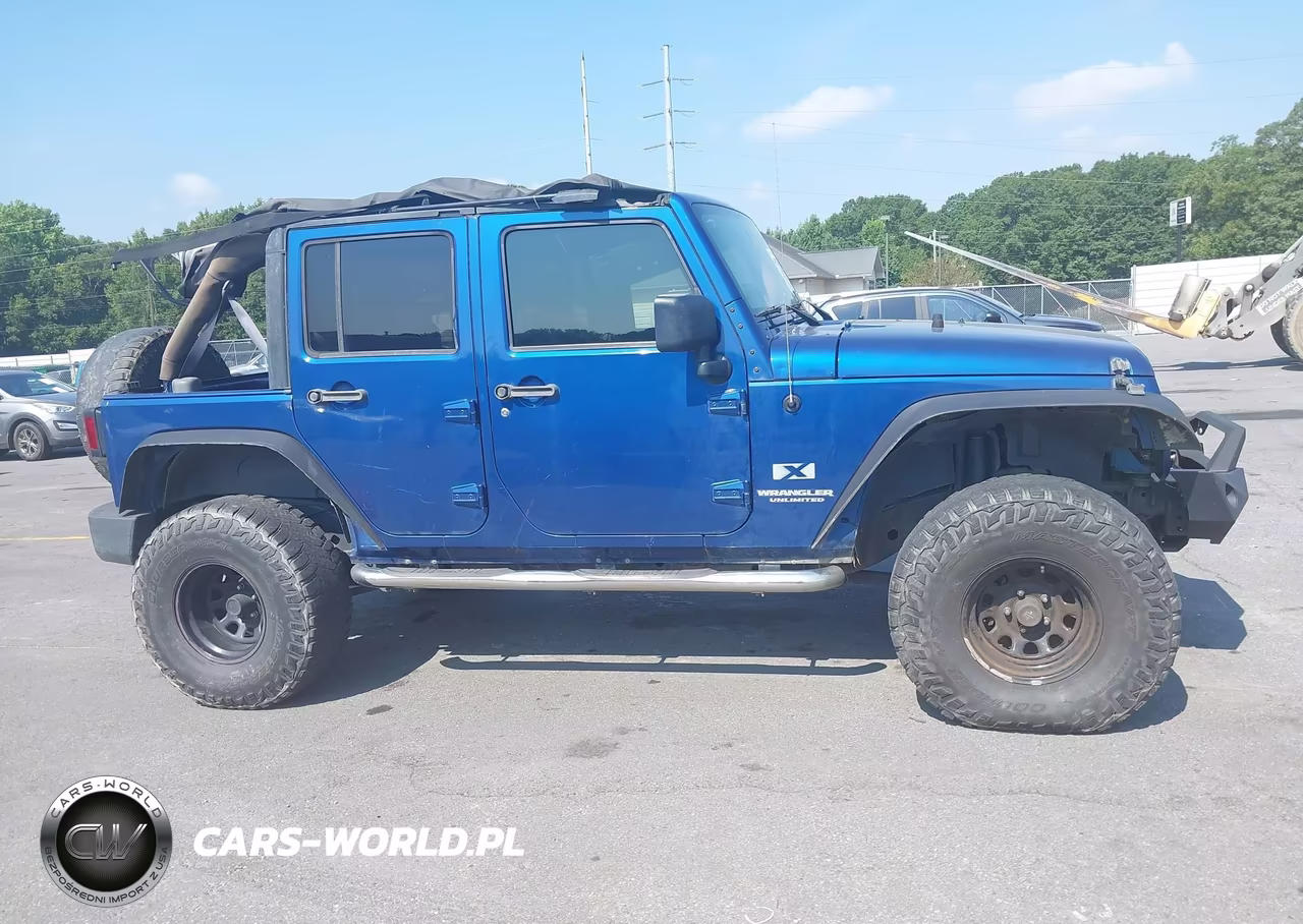 2009 Jeep Wrangler Unlimited X VIN:1J4GA39119L774580 - 13