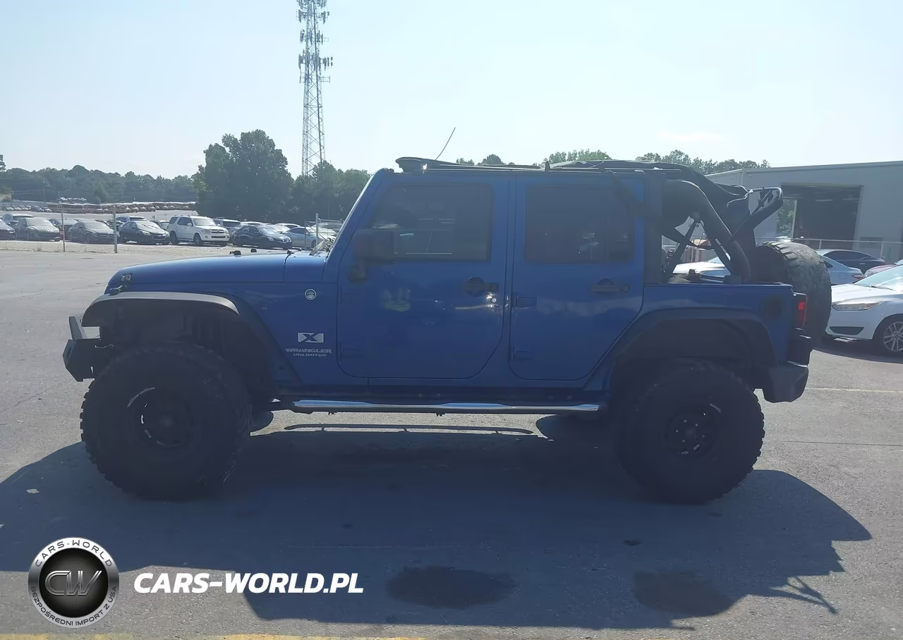 2009 Jeep Wrangler Unlimited X VIN:1J4GA39119L774580 - 14