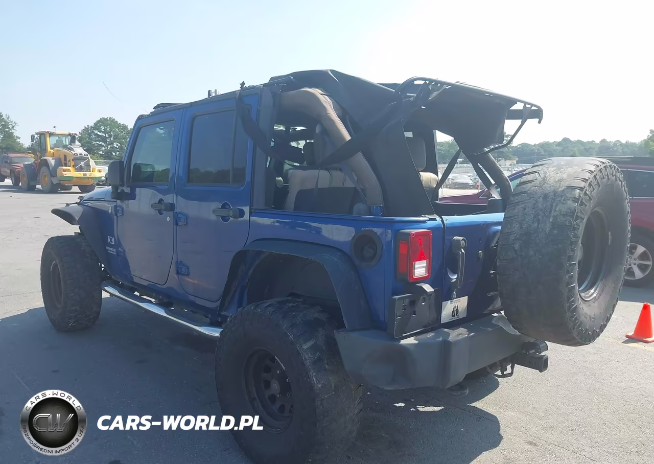 2009 Jeep Wrangler Unlimited X VIN:1J4GA39119L774580 - 3