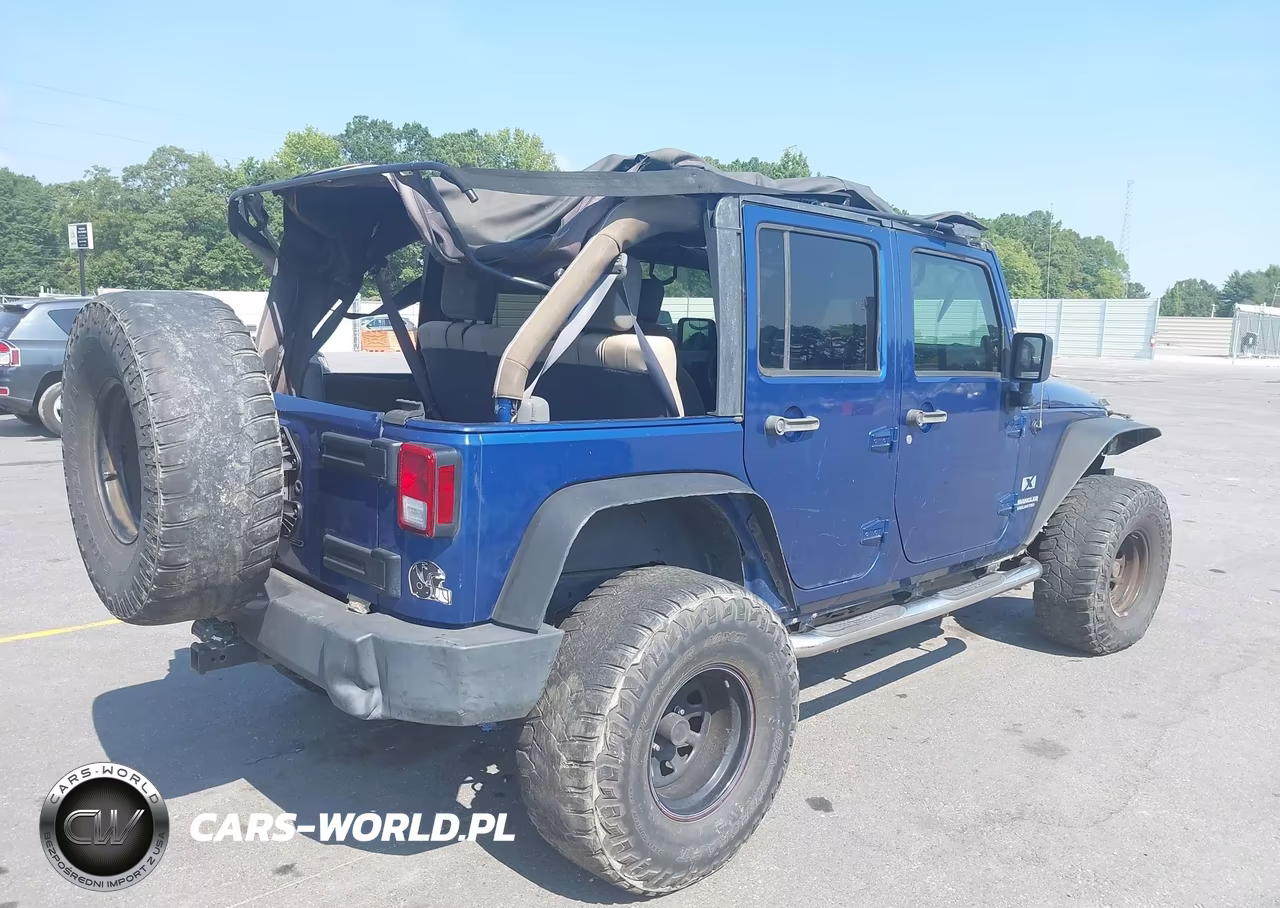 2009 Jeep Wrangler Unlimited X VIN:1J4GA39119L774580 - 4