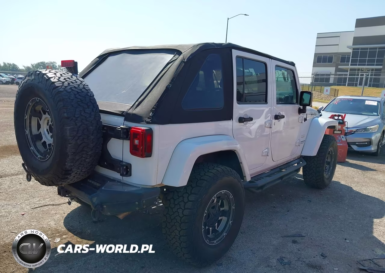 2015 Jeep Wrangler Unlimited Sahara VIN:1C4BJWEGXFL657393 - 4