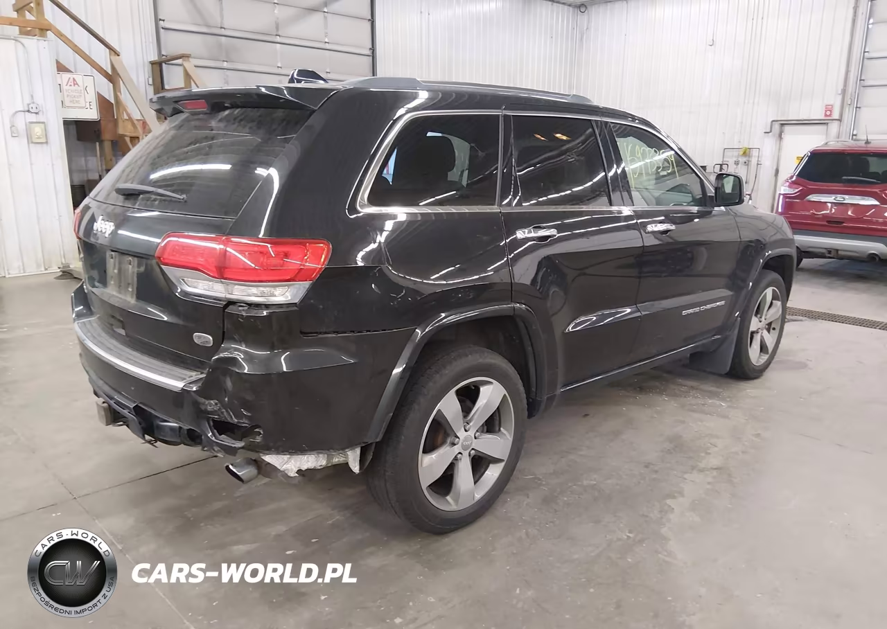 2014 Jeep Grand Cherokee Overland VIN:1C4RJFCG4EC233143 - 4