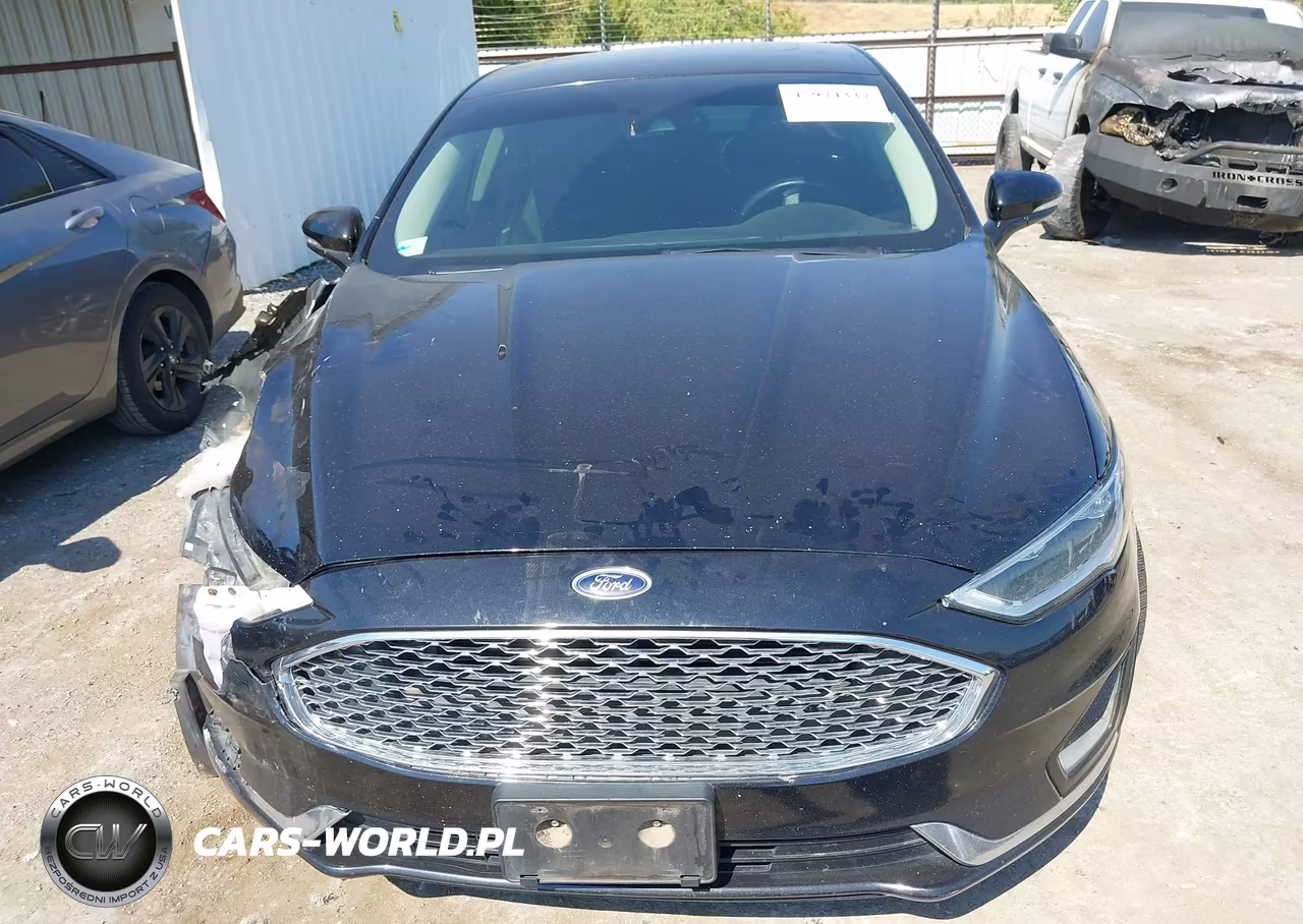 2019 Ford Fusion Hybrid Titanium VIN:3FA6P0RU0KR140022 - 12