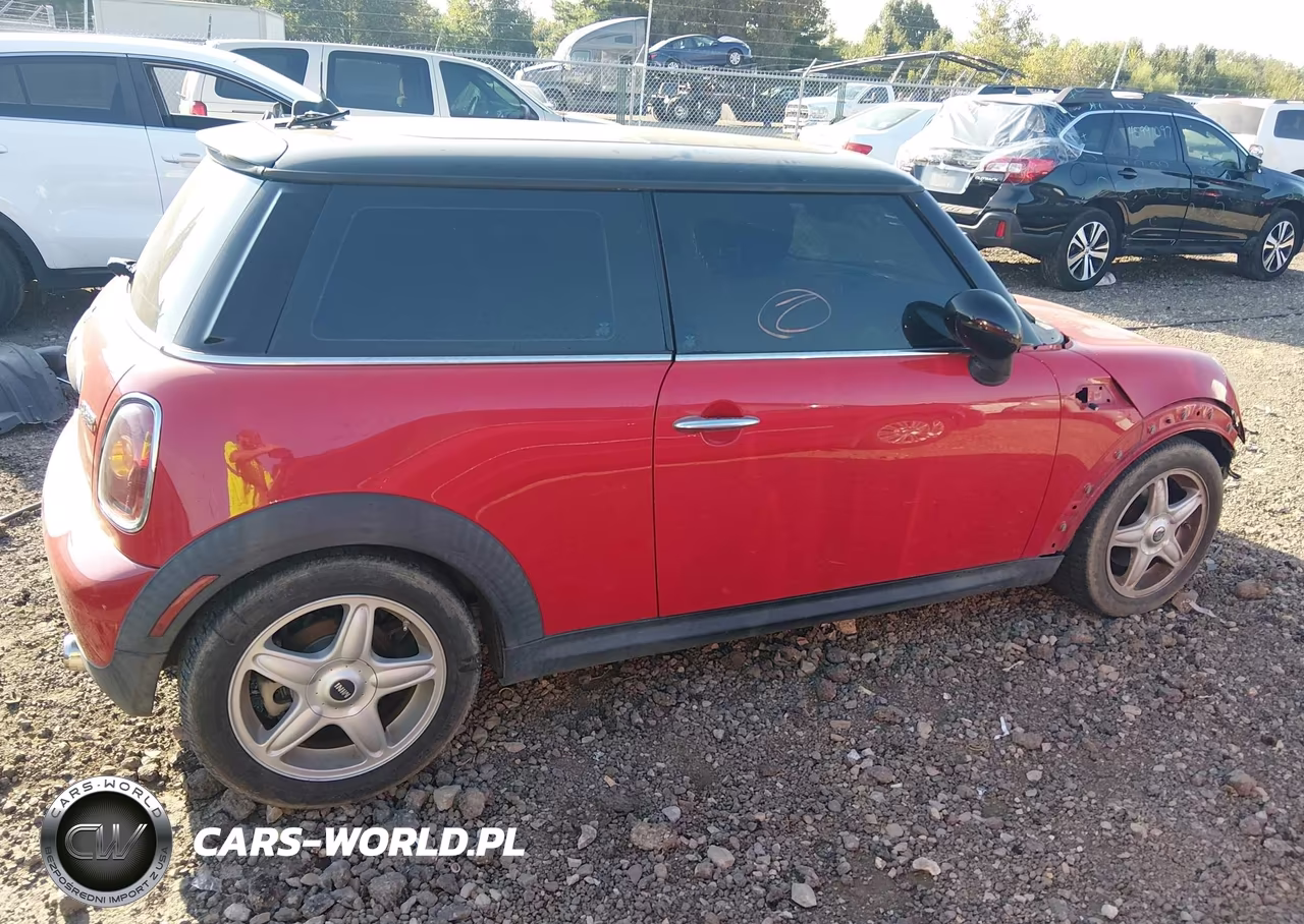 2009 Mini Cooper VIN:WMWMF335X9TW74593 - 14