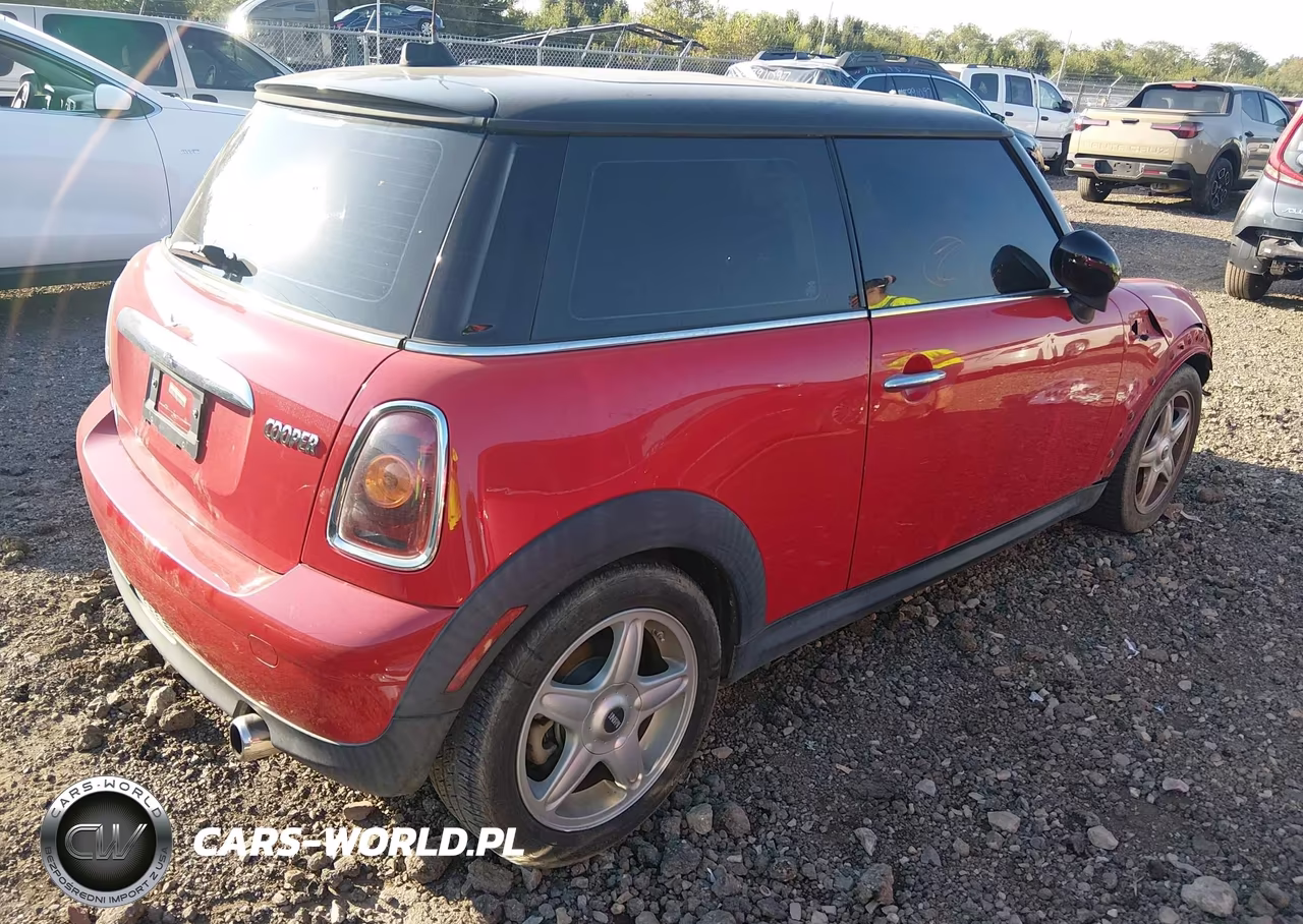 2009 Mini Cooper VIN:WMWMF335X9TW74593 - 4