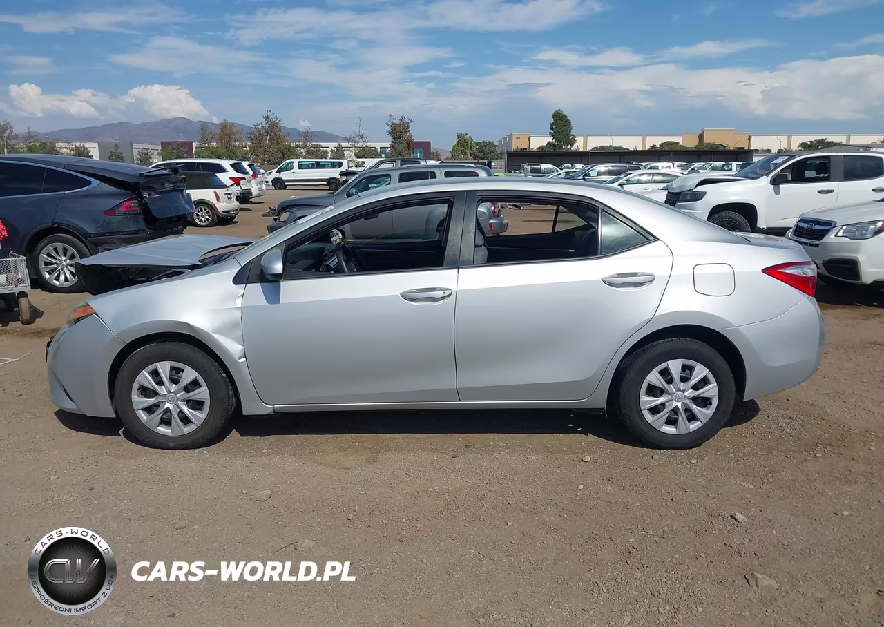 2015 Toyota Corolla L VIN:5YFBURHE9FP307764 - 14