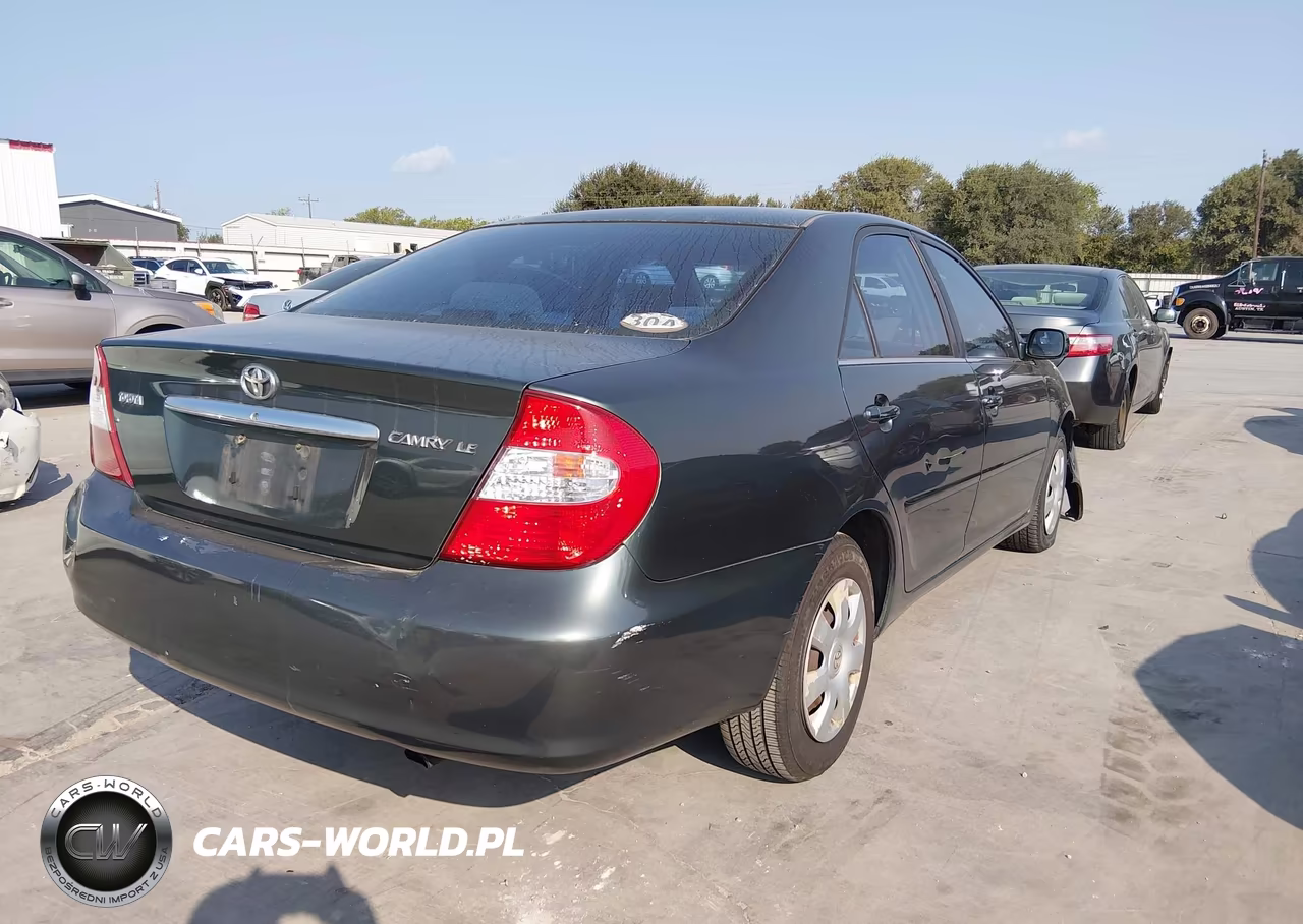 2002 Toyota Camry Le VIN:JTDBE32K420079685 - 4