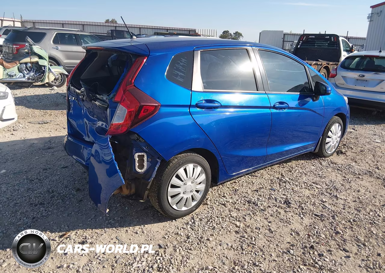 2015 Honda Fit Lx VIN:3HGGK5H50FM724803 - 4