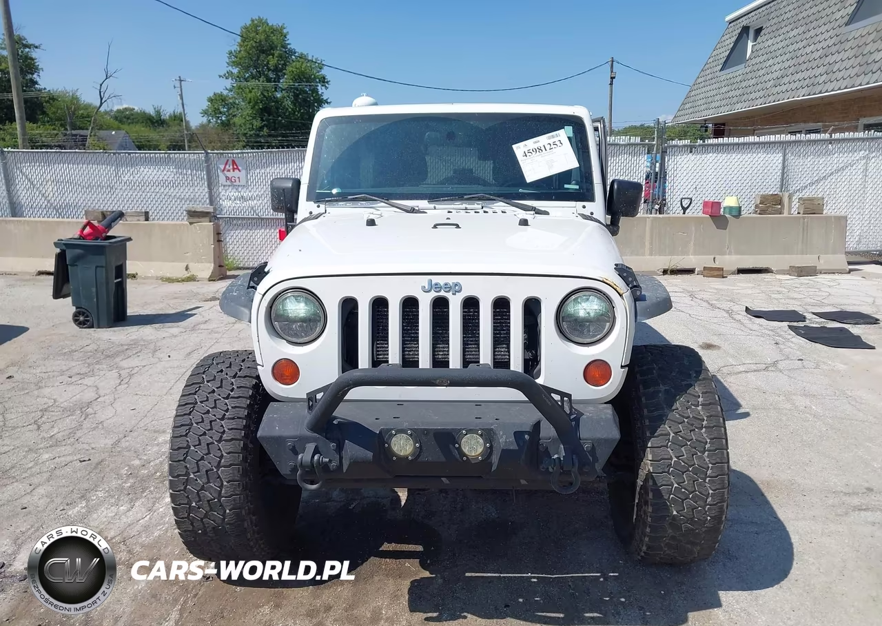 2012 Jeep Wrangler Unlimited Sahara VIN:1C4BJWEG3CL247160 - 13
