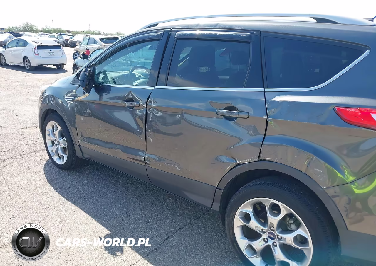 2016 Ford Escape Titanium VIN:1FMCU0J90GUB73160 - 13