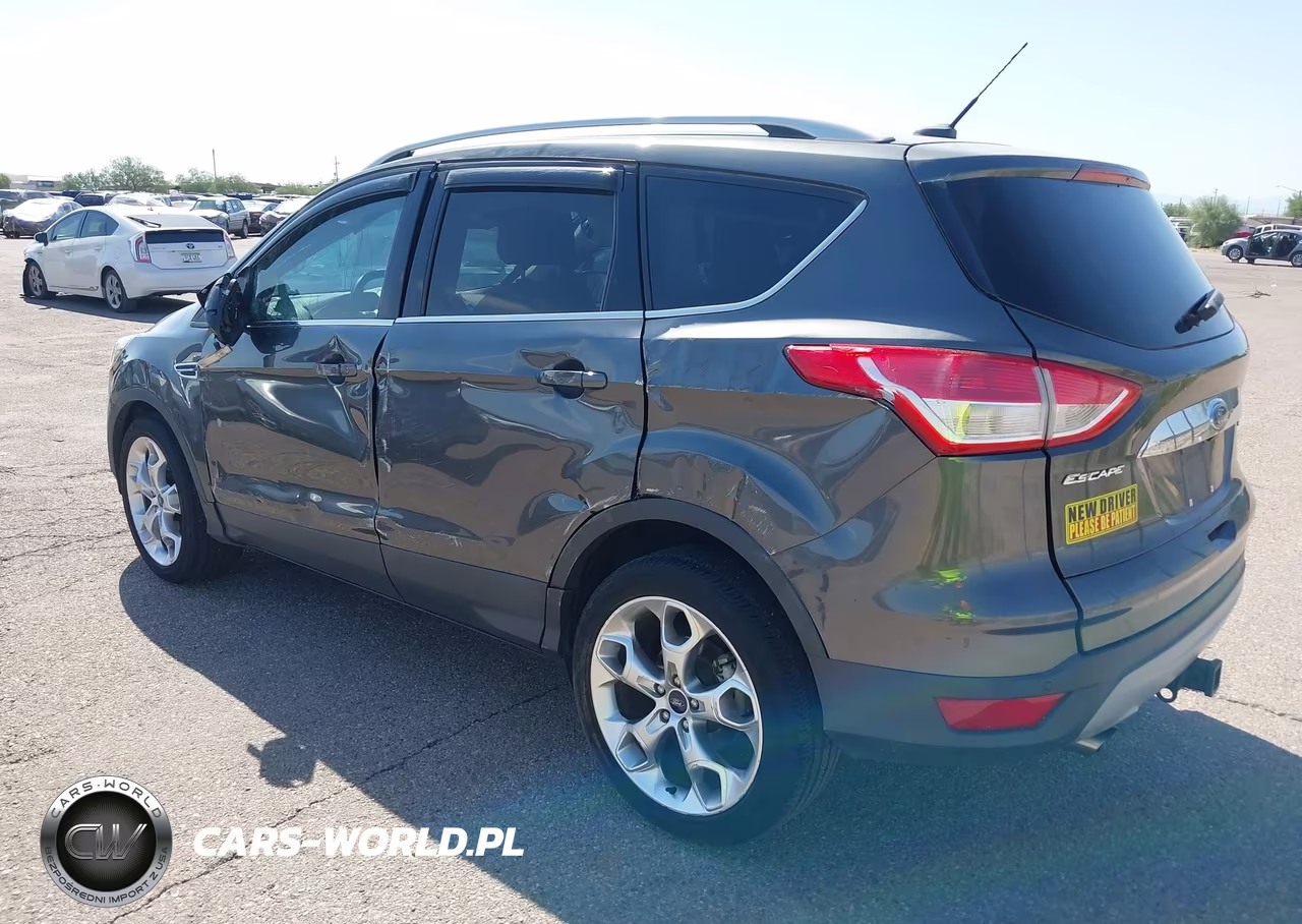 2016 Ford Escape Titanium VIN:1FMCU0J90GUB73160 - 3