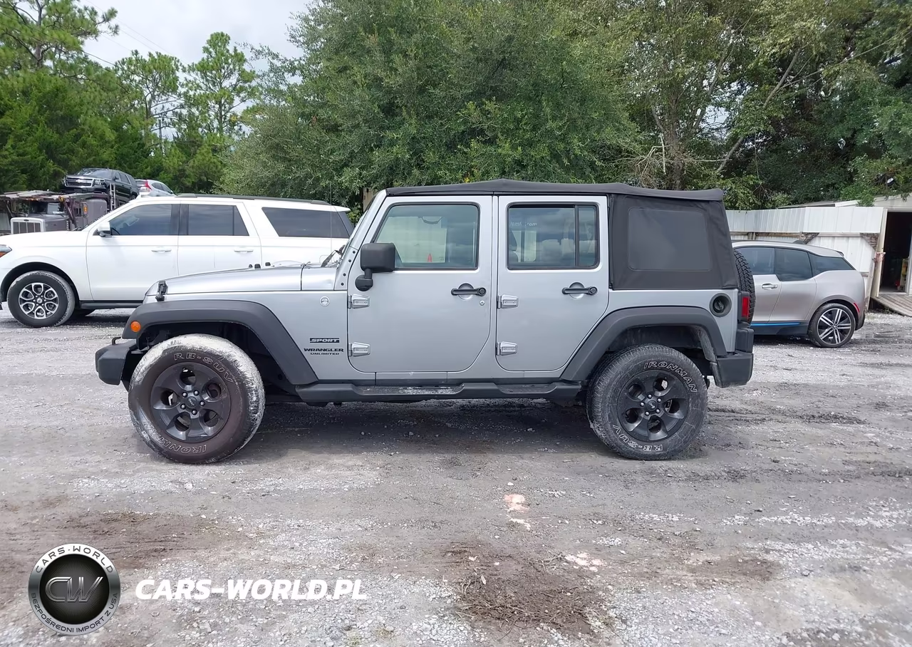 2014 Jeep Wrangler Unlimited Sport VIN:1C4BJWDGXEL106543 - 14