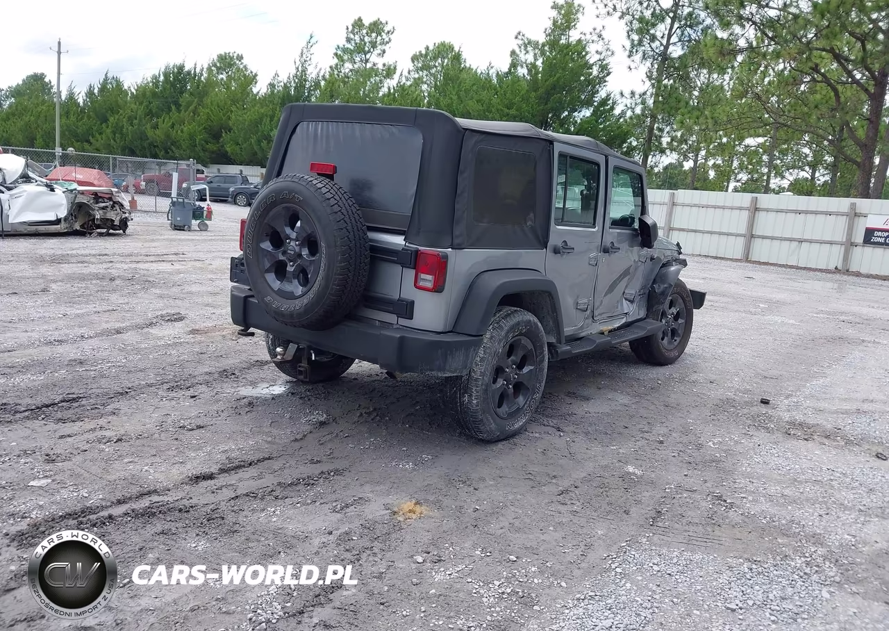 2014 Jeep Wrangler Unlimited Sport VIN:1C4BJWDGXEL106543 - 4
