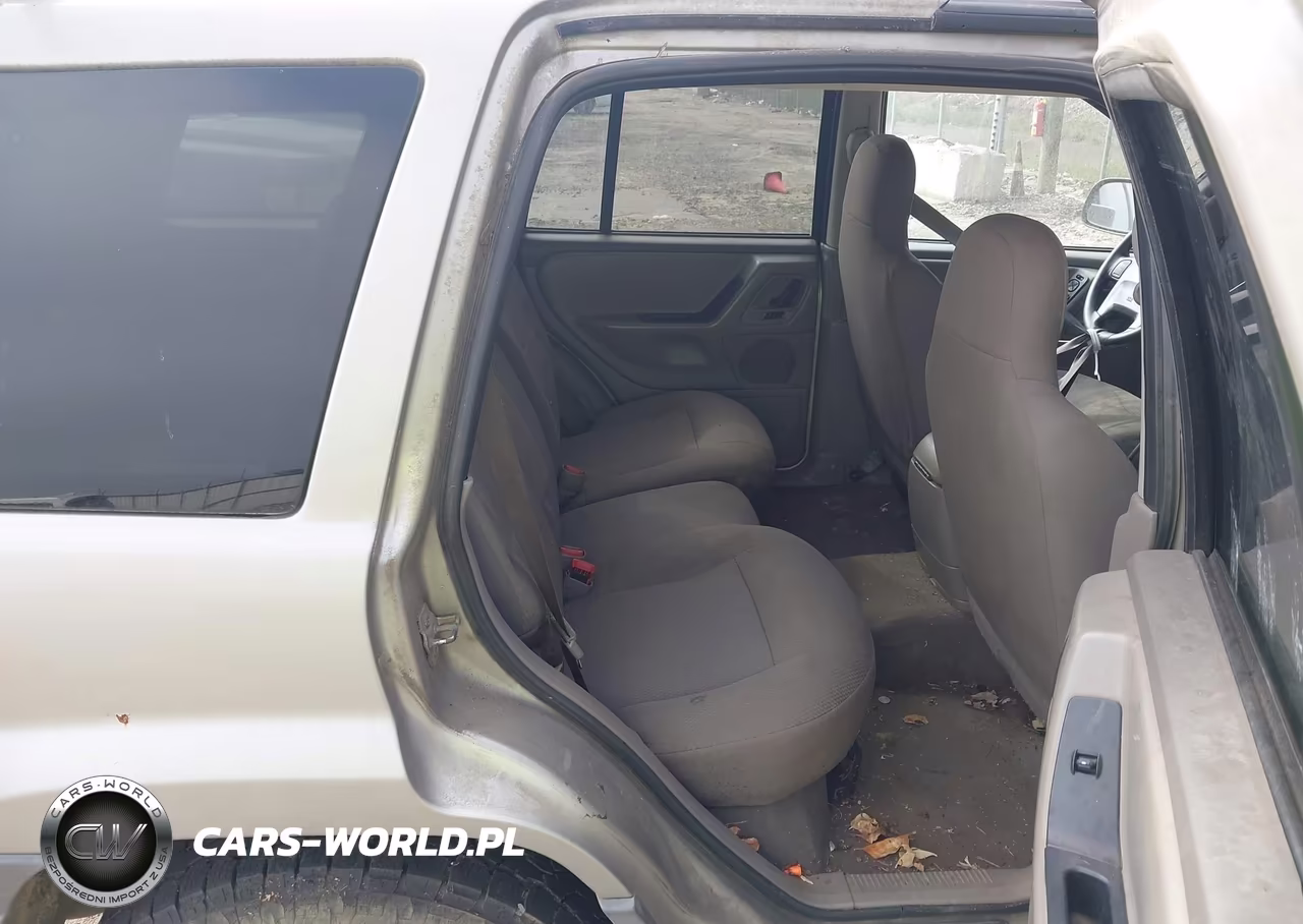 2004 Jeep Grand Cherokee Laredo VIN:1J4GW48SX4C191497 - 8