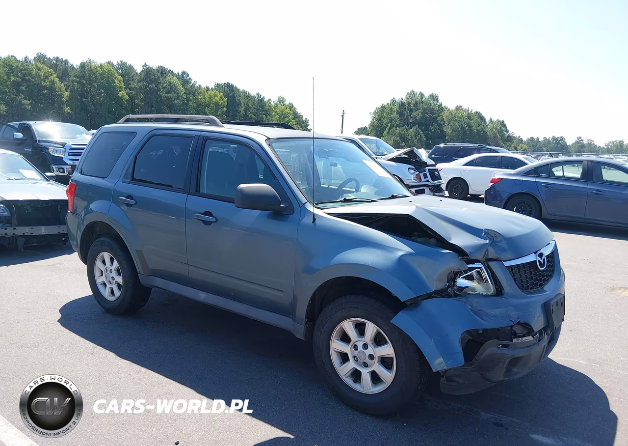2010 Mazda Tribute I Touring VIN:4F2CY0C79AKM01020 - 1