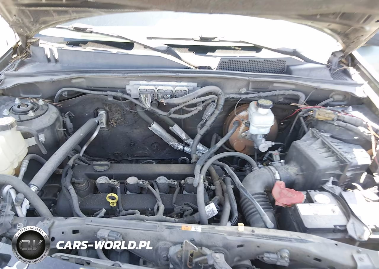 2010 Mazda Tribute I Touring VIN:4F2CY0C79AKM01020 - 10