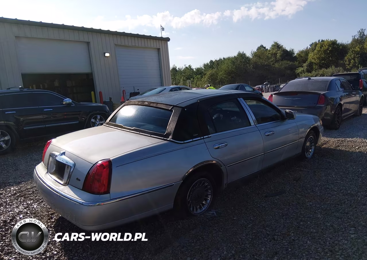 1999 Lincoln Town Car Cartier VIN:1LNFM83W4XY603571 - 4