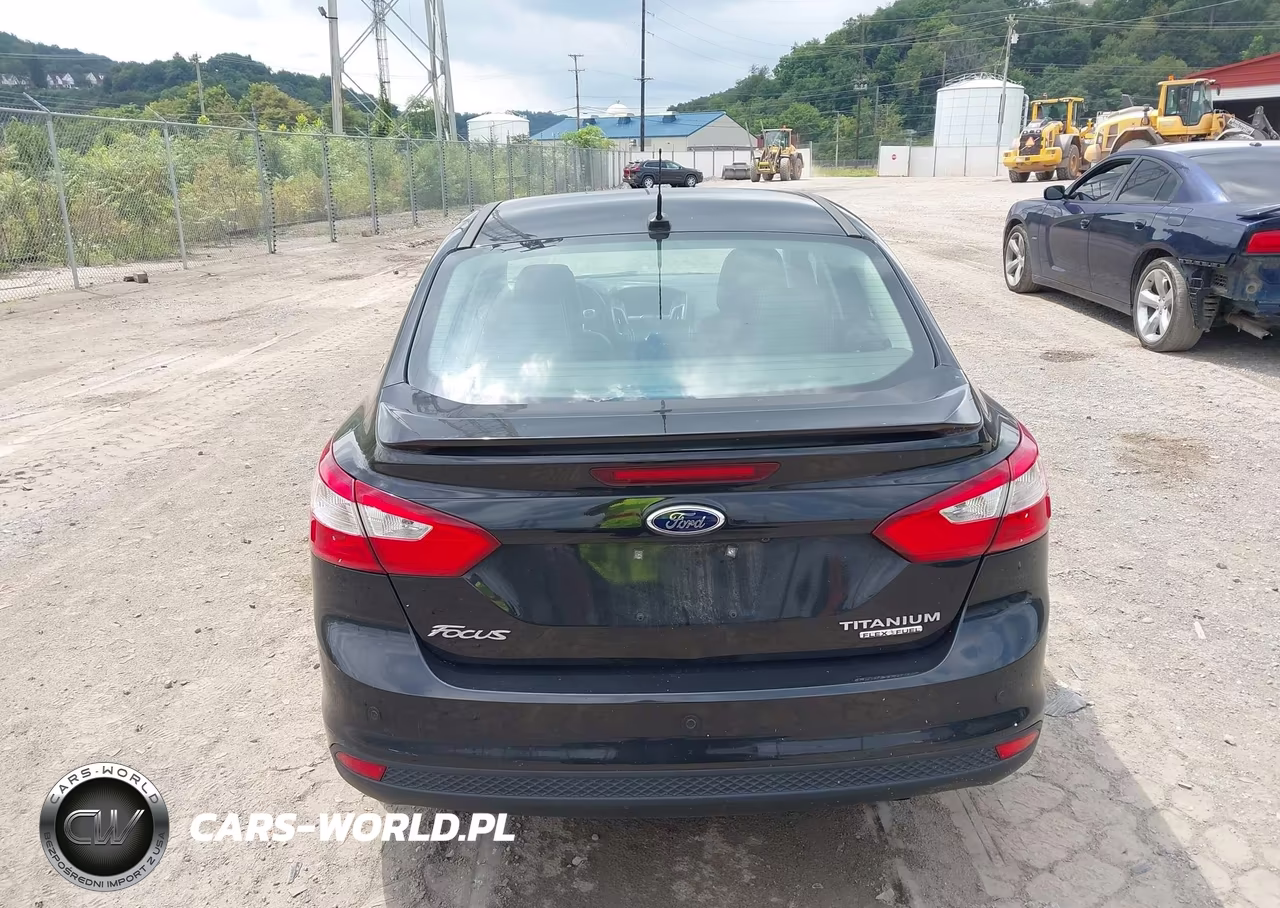 2013 Ford Focus Titanium VIN:1FADP3J26DL121978 - 17
