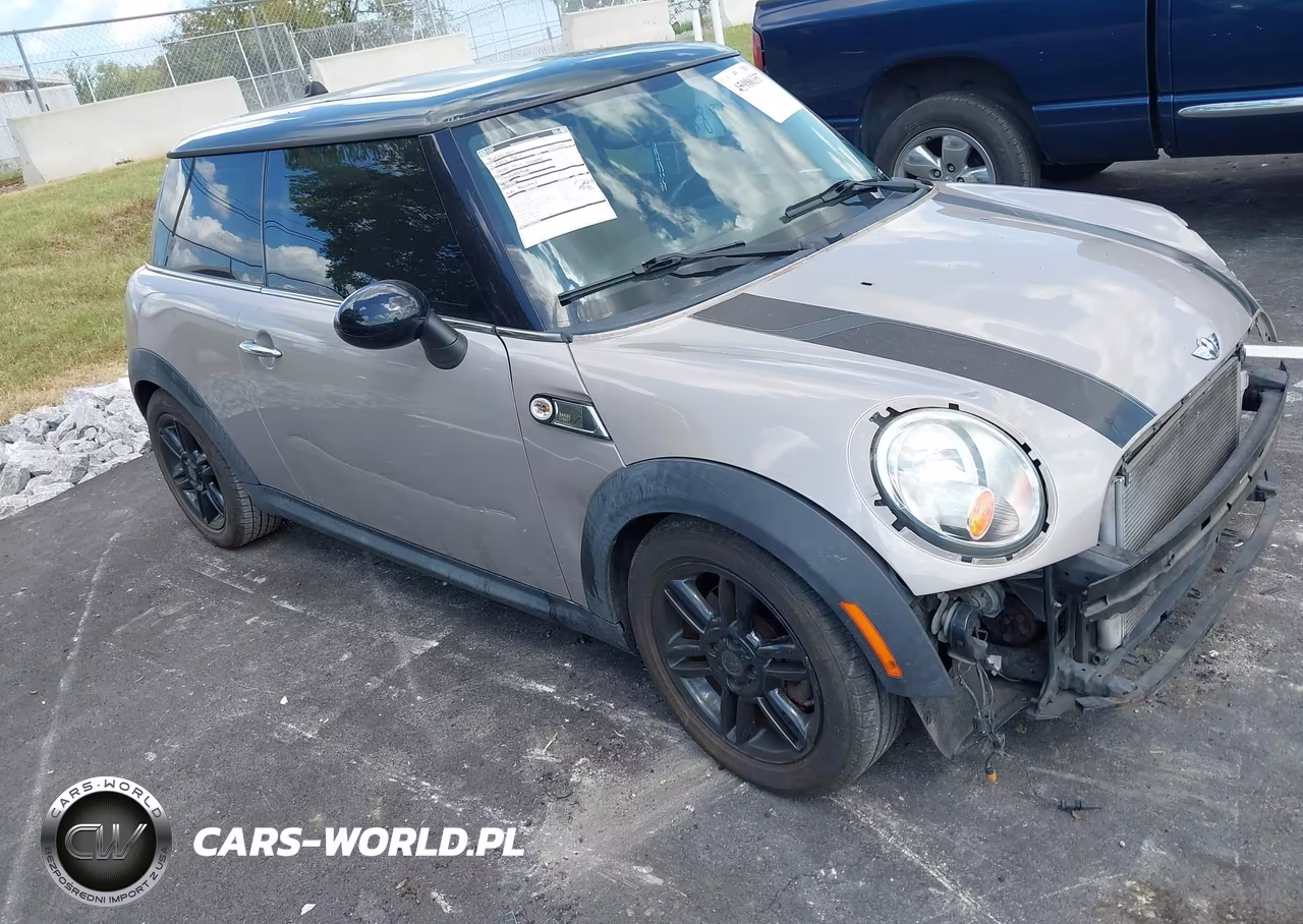 2012 Mini Cooper VIN:WMWSU3C5XCT264719 - 1
