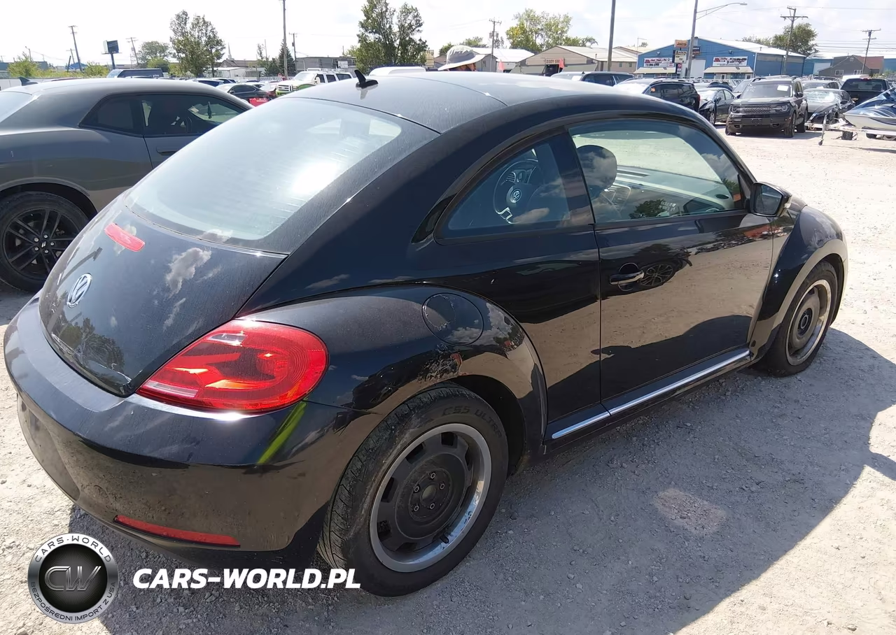 2012 Volkswagen Beetle 2.5L VIN:3VWJP7AT4CM610886 - 4