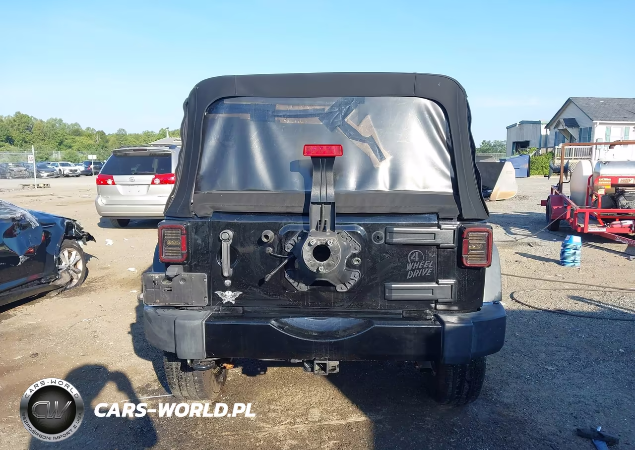 2016 Jeep Wrangler Unlimited Willys Wheeler VIN:1C4BJWDG9GL143067 - 16