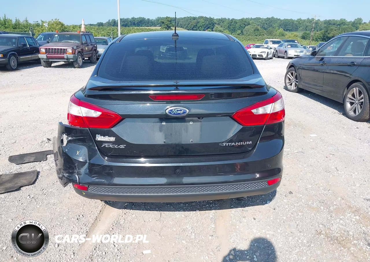 2014 Ford Focus Titanium VIN:1FADP3J28EL378027 - 16