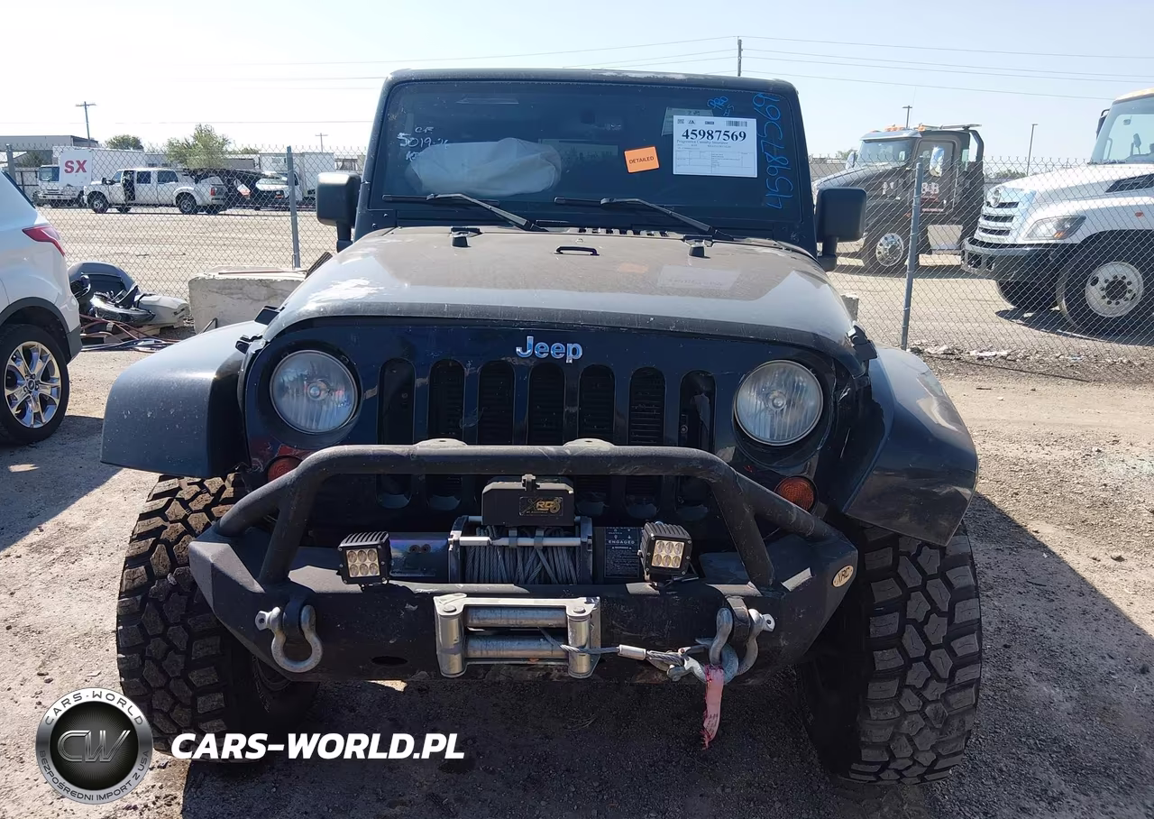 2012 Jeep Wrangler Unlimited Sahara VIN:1C4BJWEG1CL125154 - 12