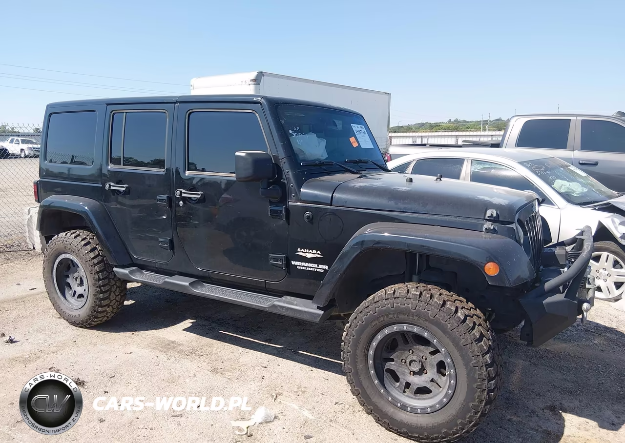 2012 Jeep Wrangler Unlimited Sahara VIN:1C4BJWEG1CL125154 - 13