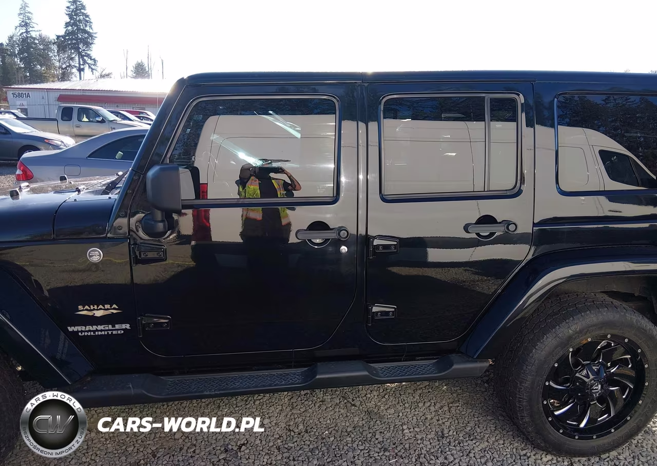 2012 Jeep Wrangler Unlimited Sahara VIN:1C4BJWEG3CL169639 - 14
