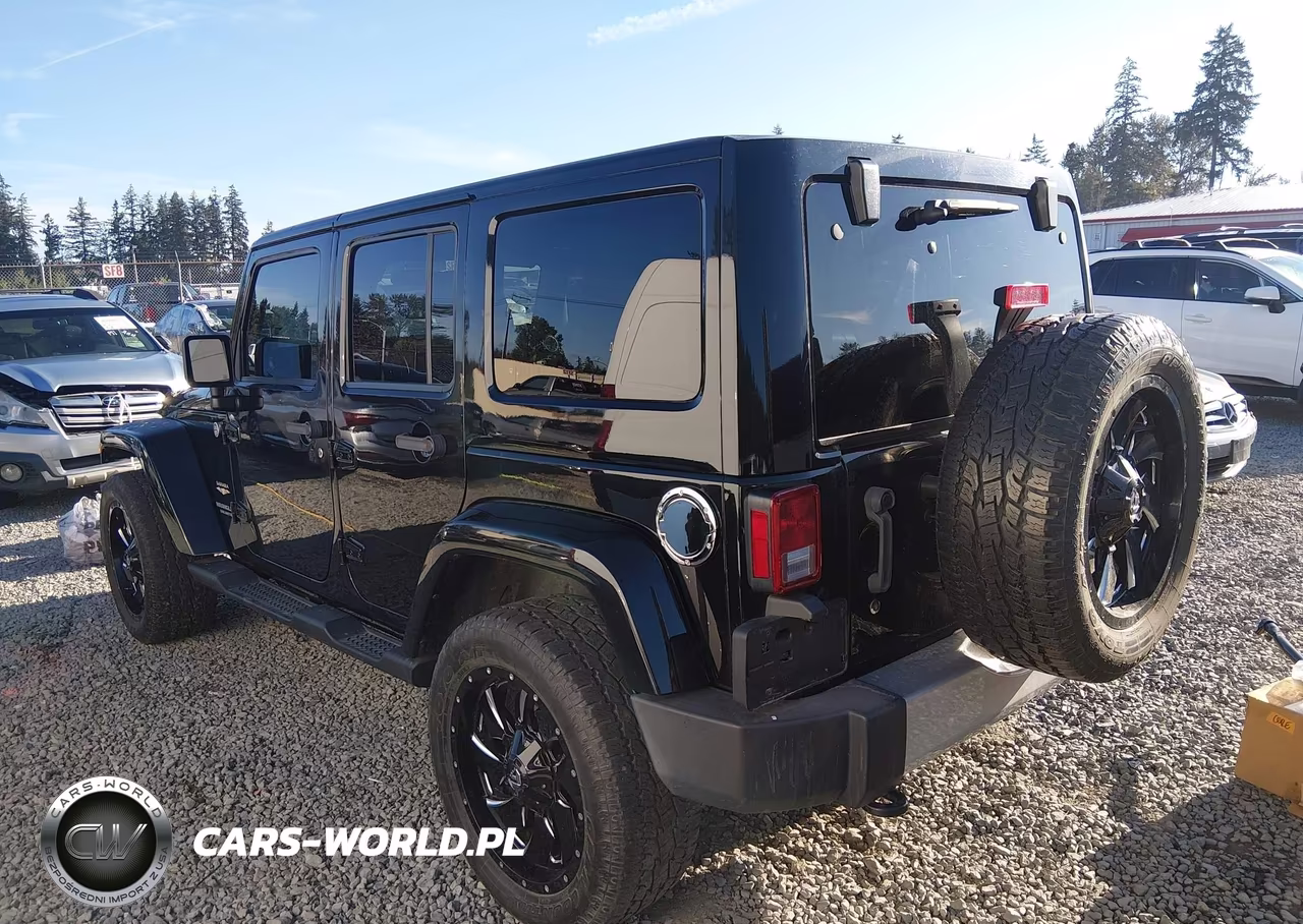 2012 Jeep Wrangler Unlimited Sahara VIN:1C4BJWEG3CL169639 - 3