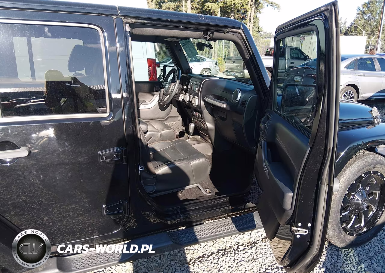 2012 Jeep Wrangler Unlimited Sahara VIN:1C4BJWEG3CL169639 - 5