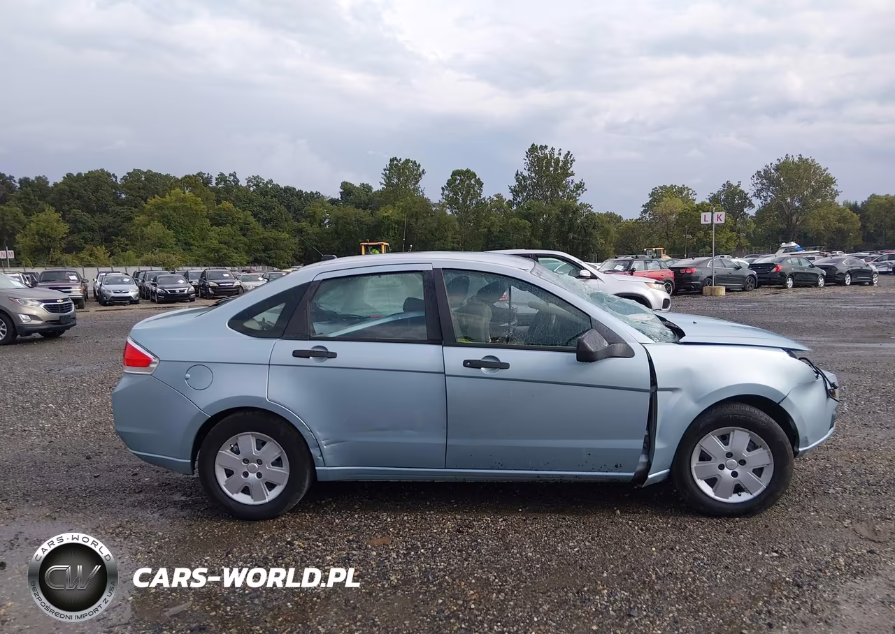 2009 Ford Focus S VIN:1FAHP34N09W256709 - 12