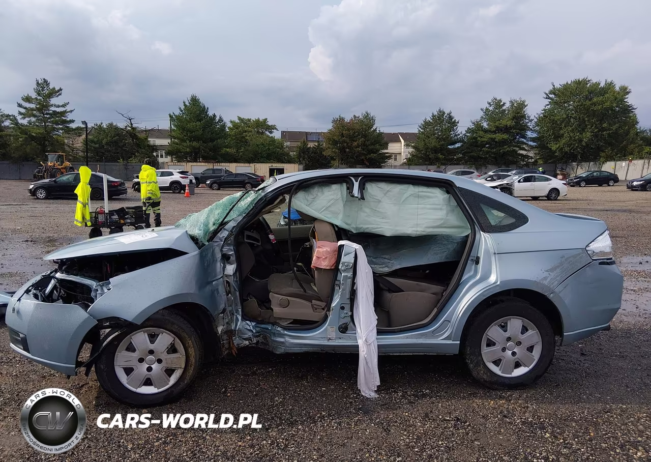 2009 Ford Focus S VIN:1FAHP34N09W256709 - 13