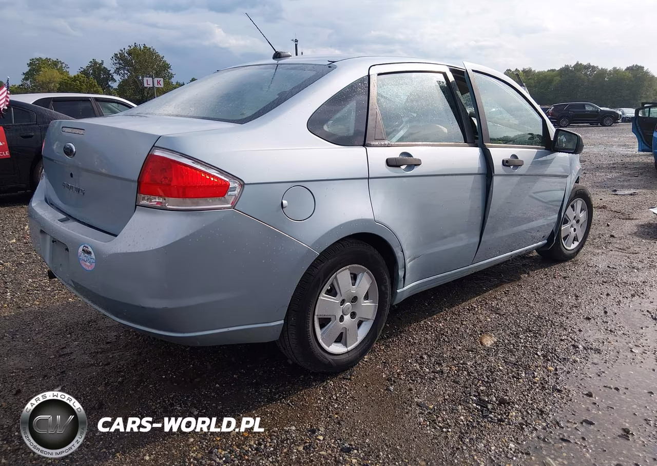 2009 Ford Focus S VIN:1FAHP34N09W256709 - 4