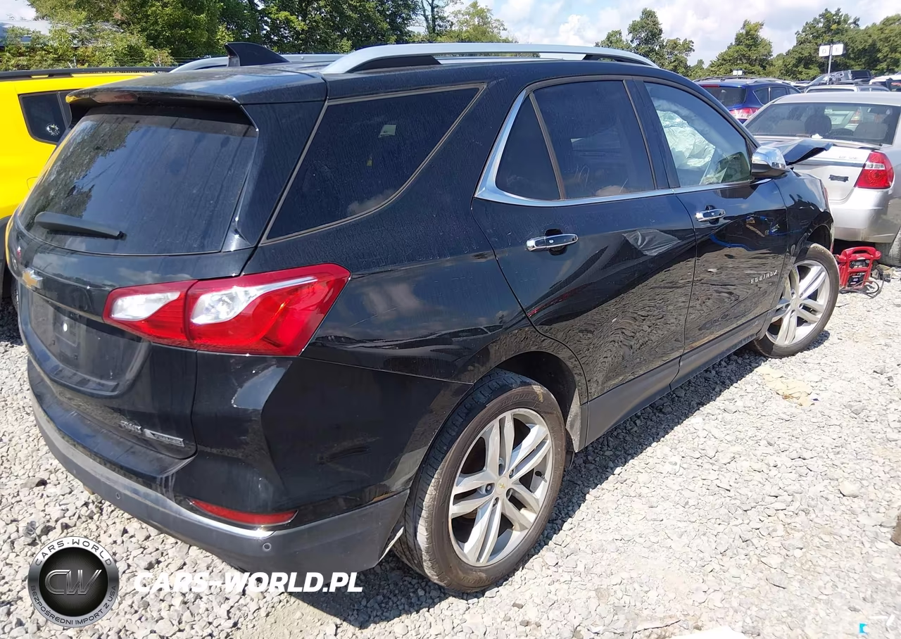 2018 Chevrolet Equinox Premier VIN:2GNAXWEX4J6222856 - 4