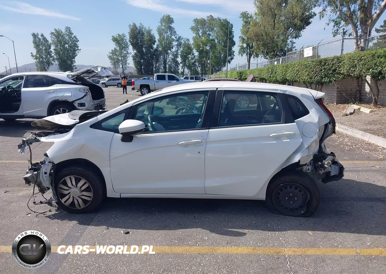 2015 Honda Fit Lx VIN:3HGGK5H56FM773391 - 16