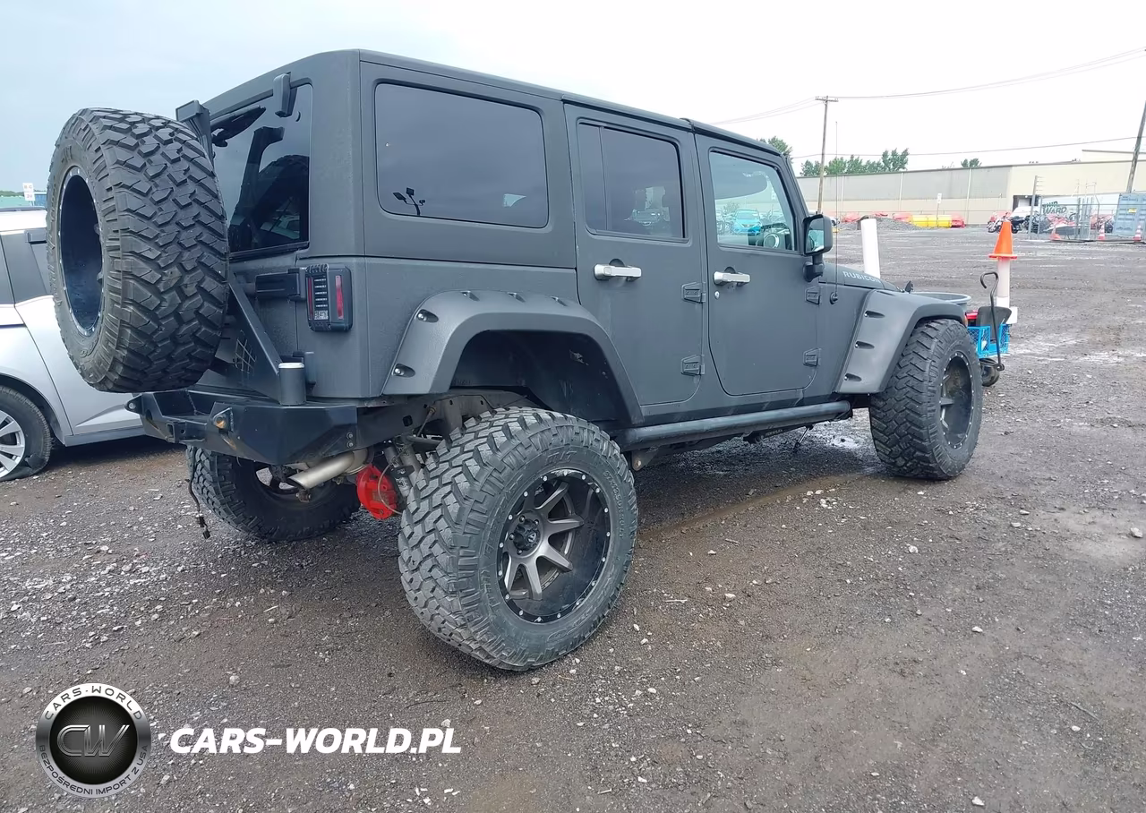 2016 Jeep Wrangler Unlimited Rubicon VIN:1C4HJWFG4GL178705 - 4