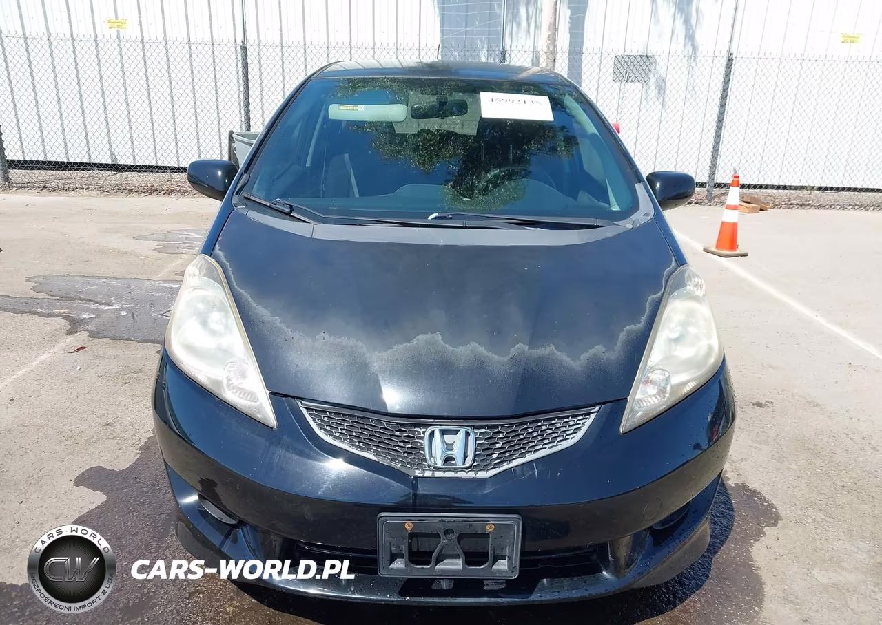 2011 Honda Fit Sport VIN:JHMGE8H50BS010452 - 12