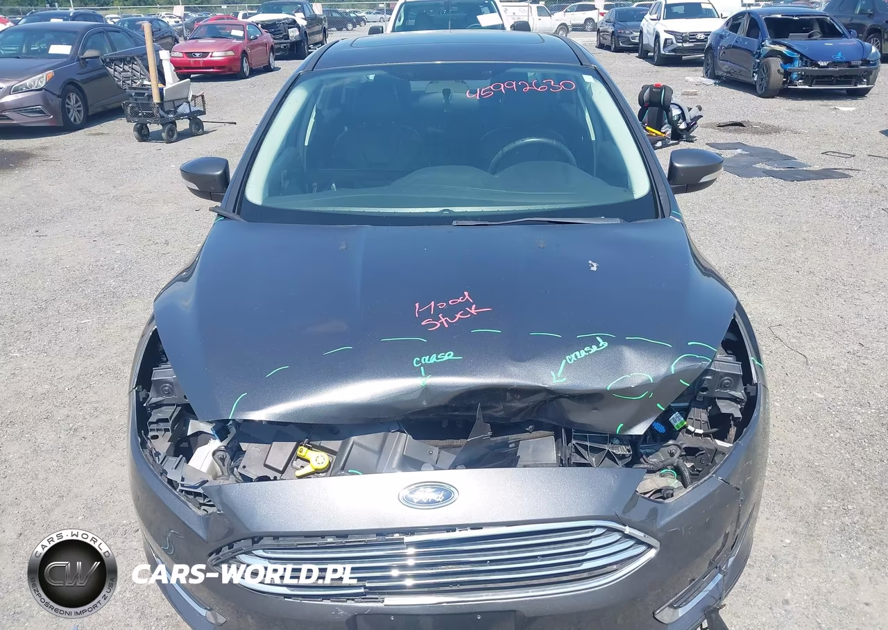 2017 Ford Focus Titanium VIN:1FADP3J29HL282475 - 10